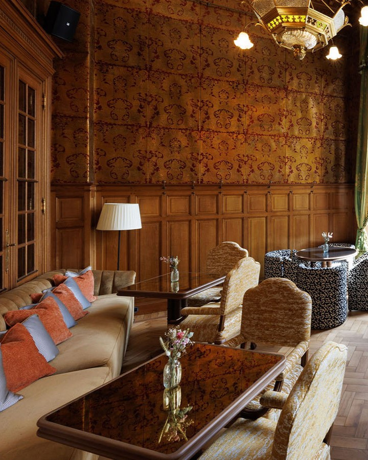 The Grand Foyer of Fleur de Ville with lounge chairs and tales in Brussels, Belgium. 