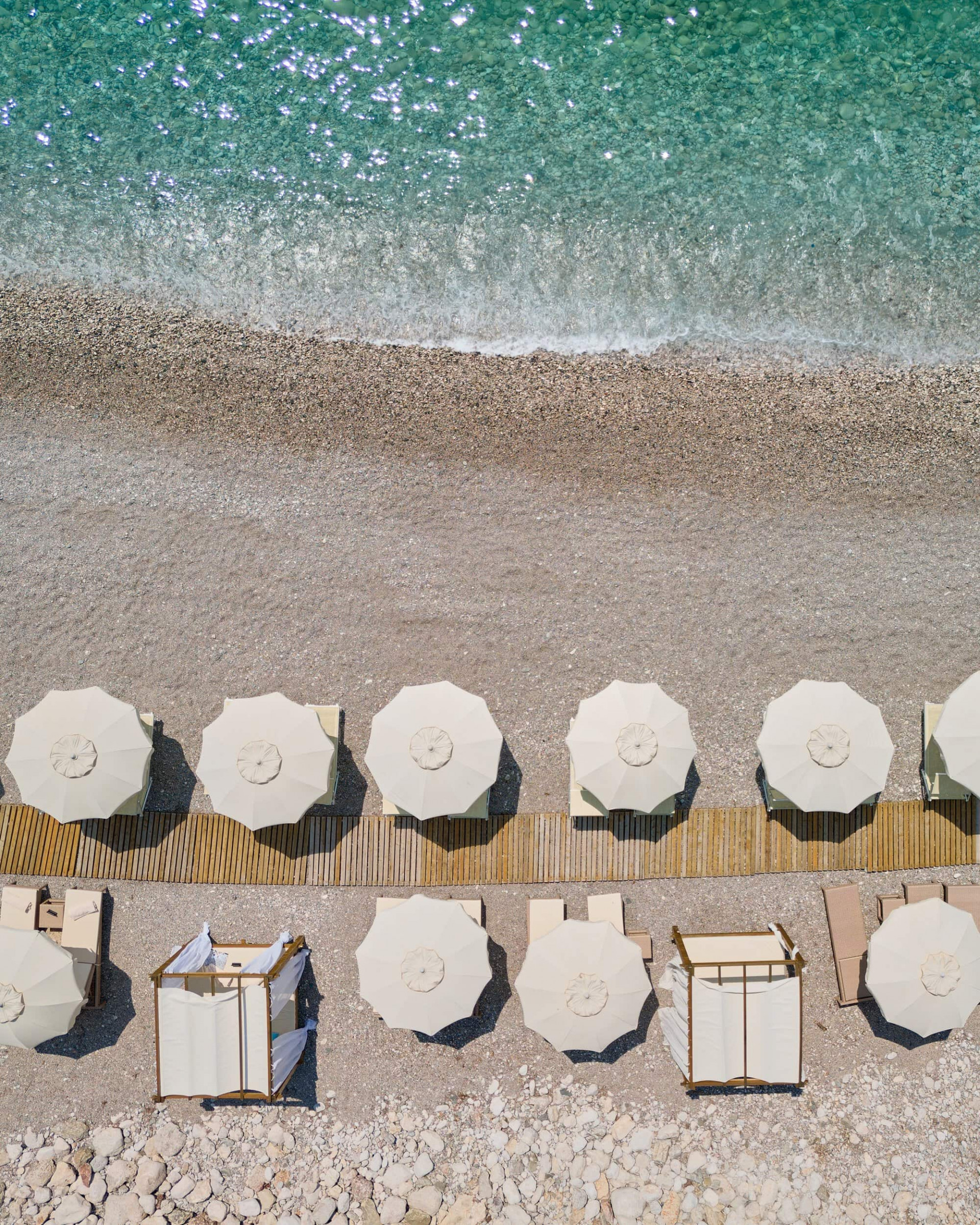 Beach Club with sun loungers and Balinese daybeds overlooking the beach in Montenegro