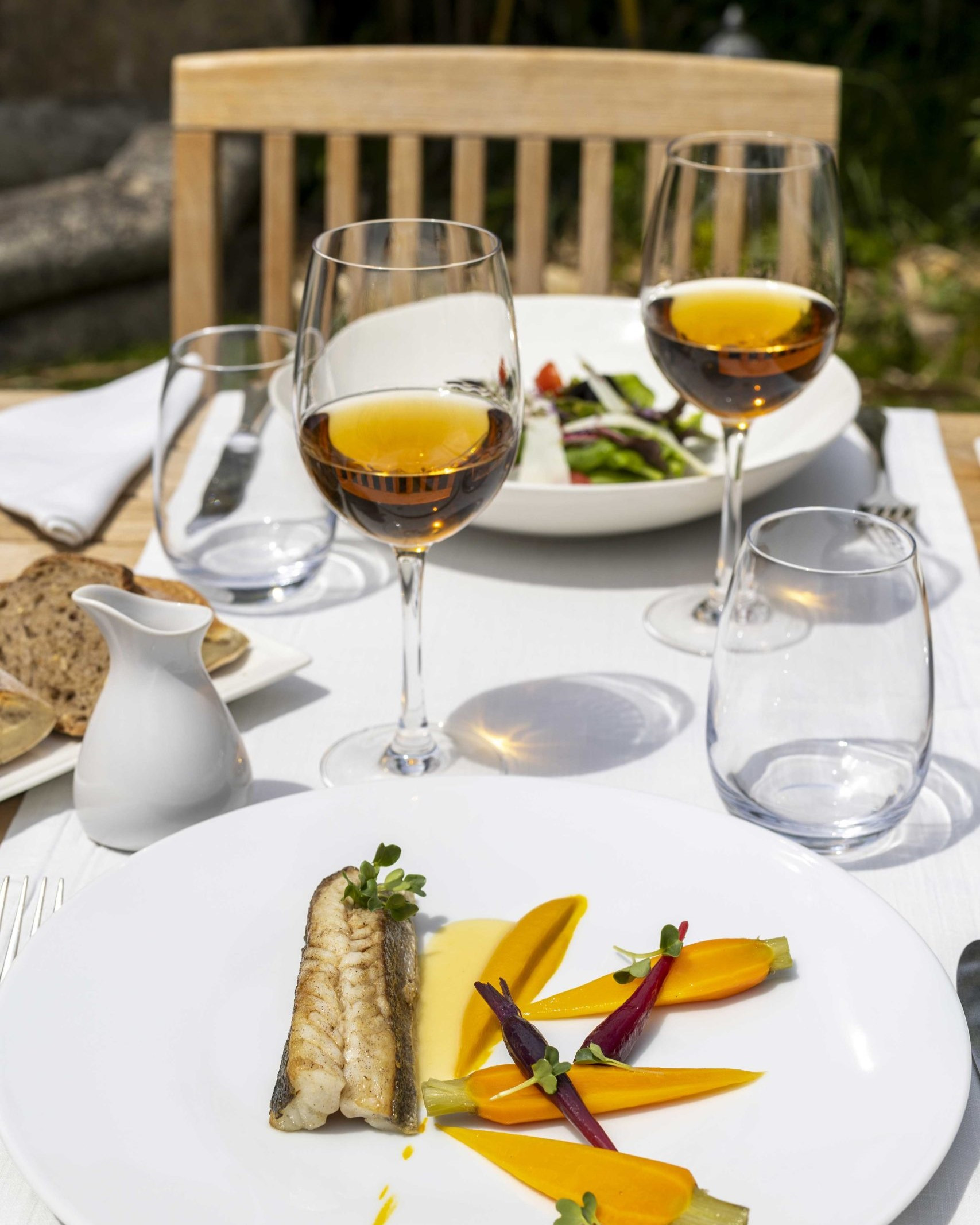 Table with glasses of wine at boutique hotel La Signoria in Corsica