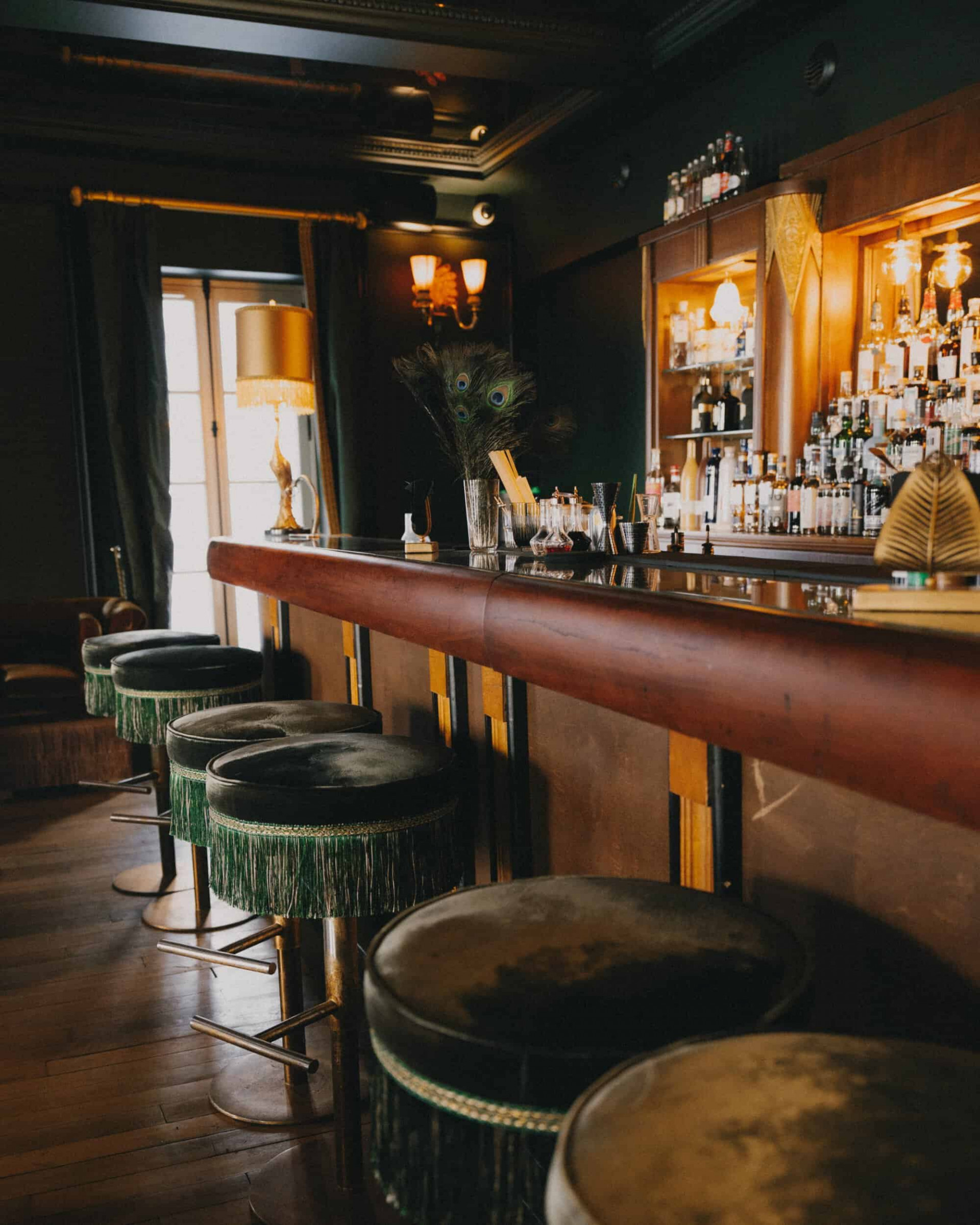 Bar with different wines at hotel boutique Maison Maubreuil in Nantes. 