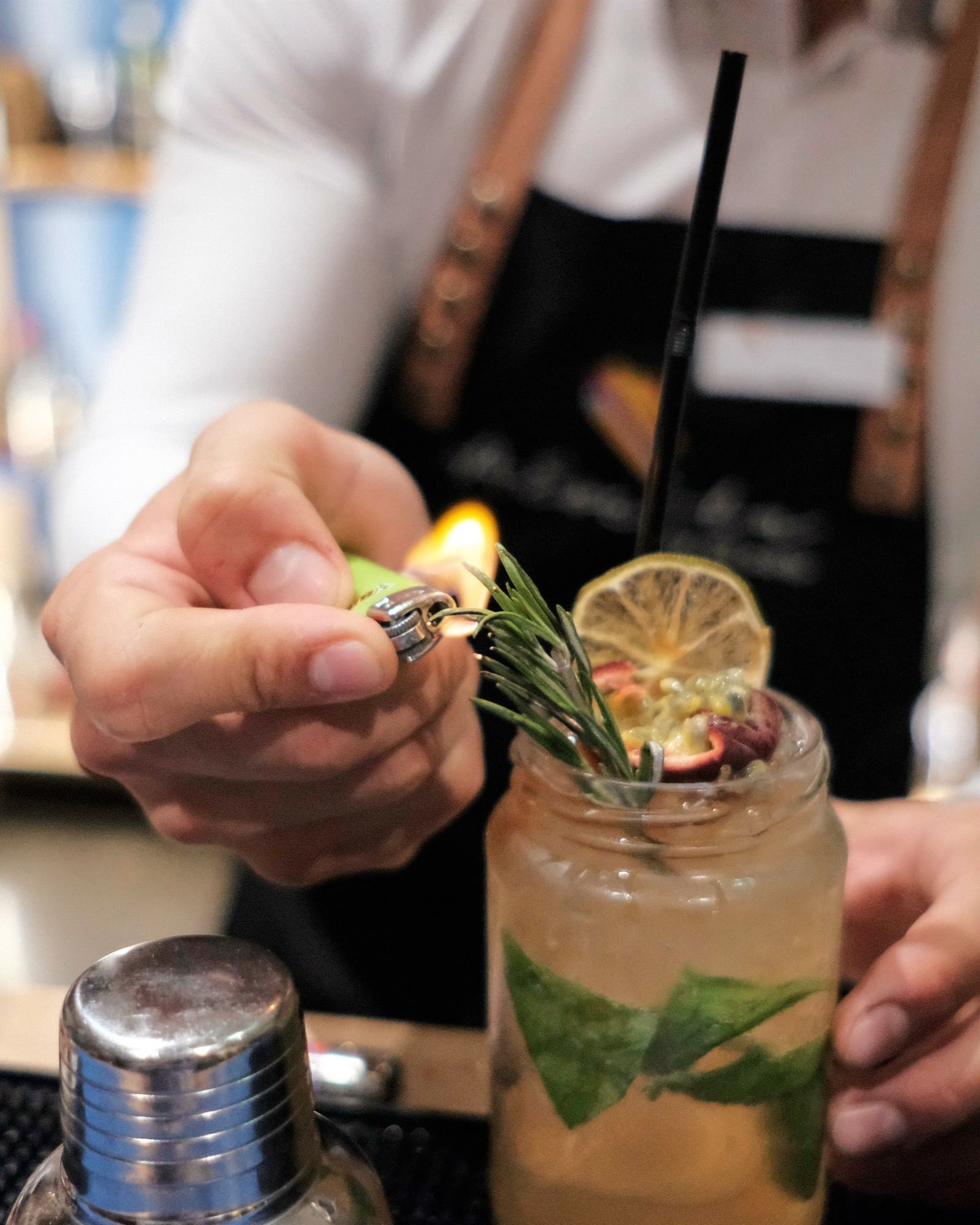 Creative cocktail with rosemary and flames at B’Artist, the bar at The Editory Artist. 